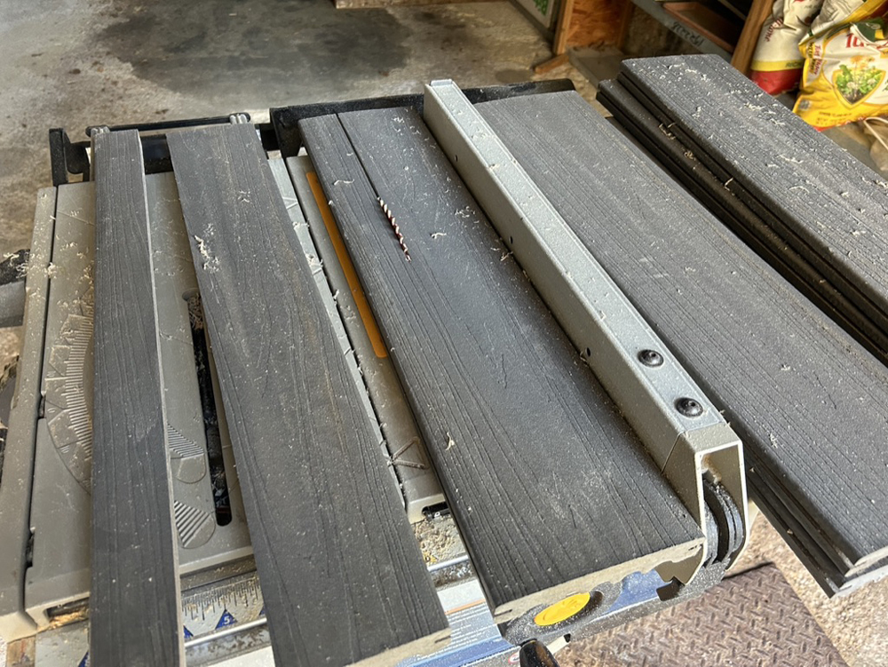 gray composite boards on saw