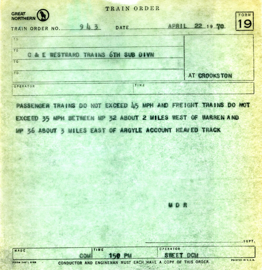 Scan of train order with printed boxes and typewritten information