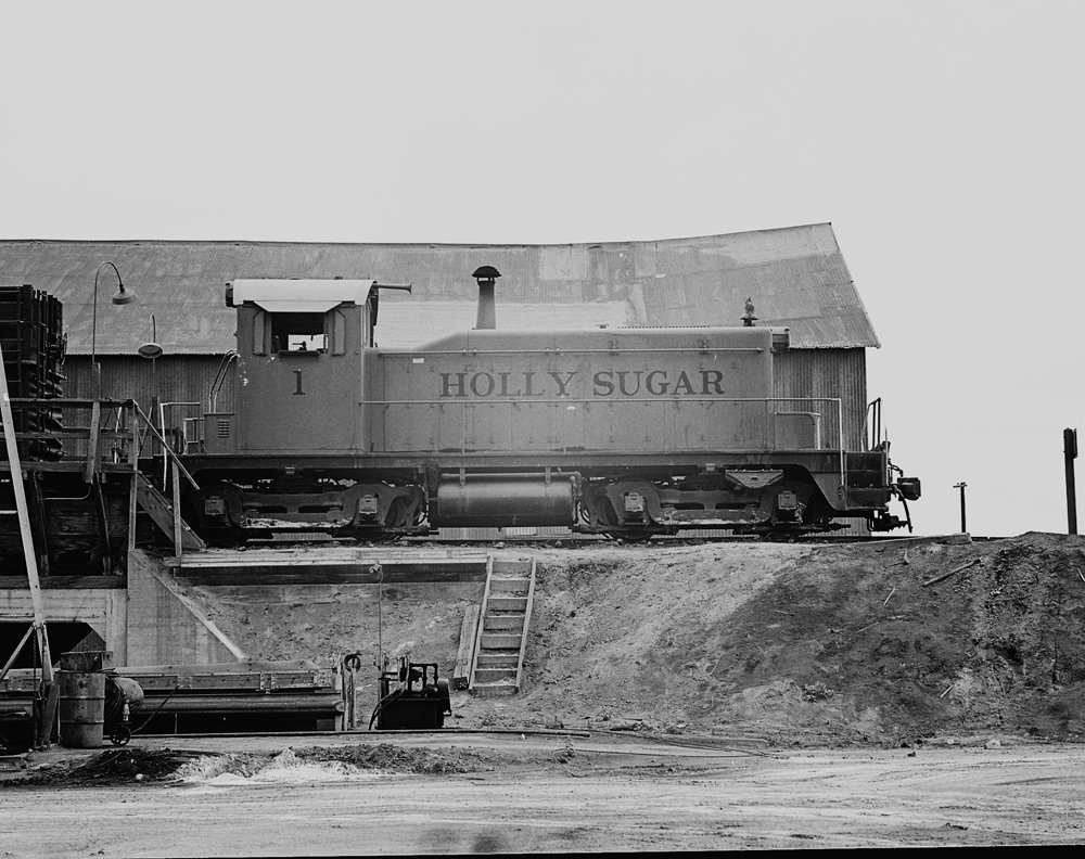black and white photo of side view of locomotive