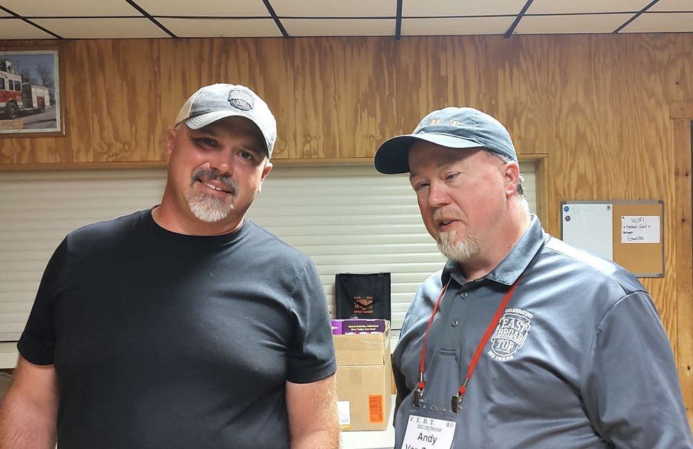 Two men wearing gray baseball caps