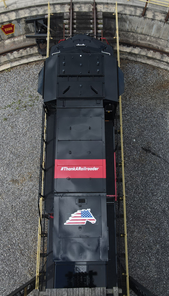 Top view of locomotive showing "Thank a railroader" and flag details