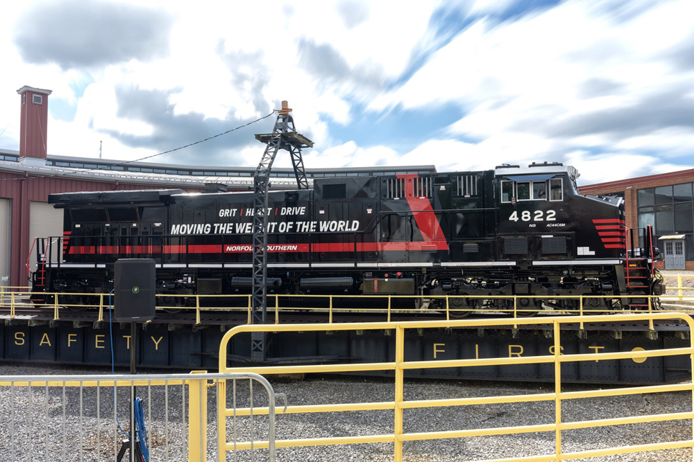 Side view of unit with the "Moving the weight of the world" slogan. 