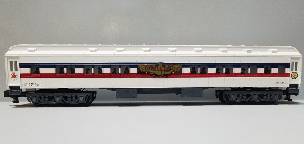 red, white, and blue model Pullman car
