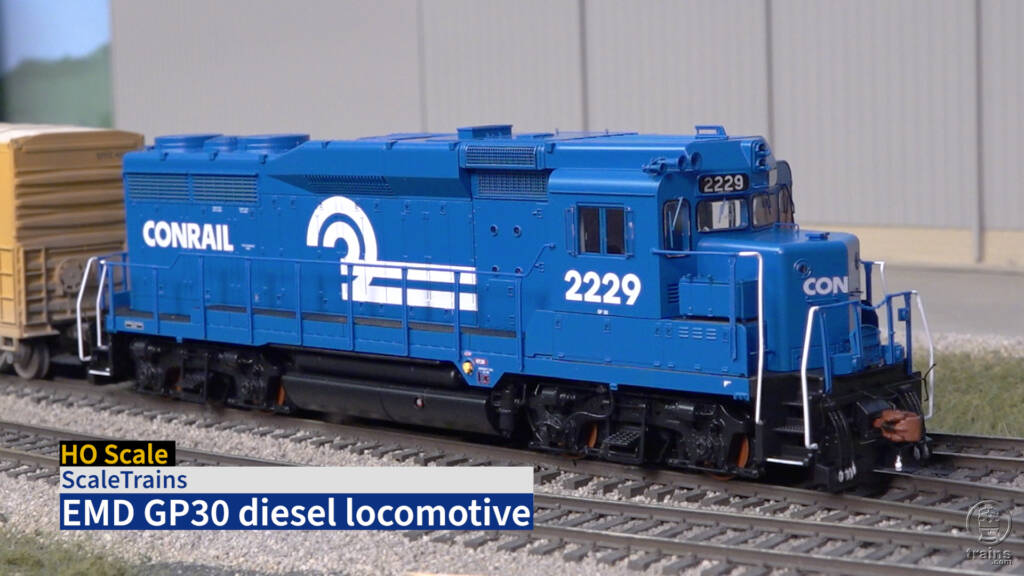 Title screen of video showing HO scale diesel locomotive painted blue and black with white graphics.