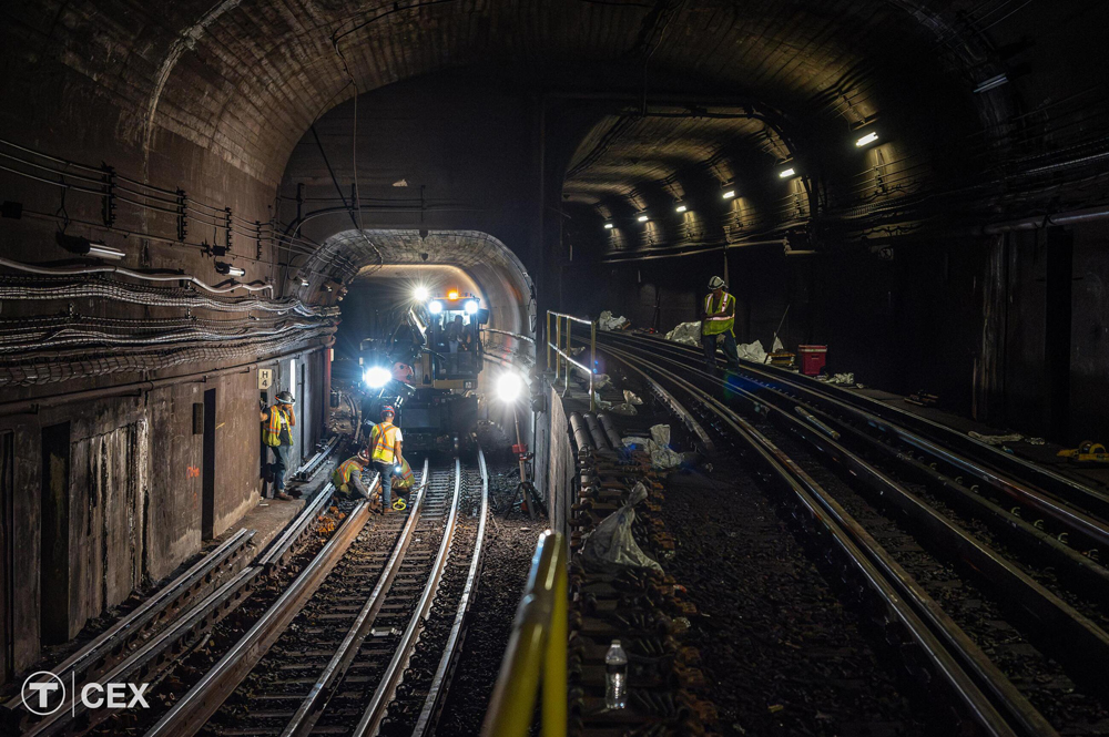 Maintenance crew working in tunnels of transit system