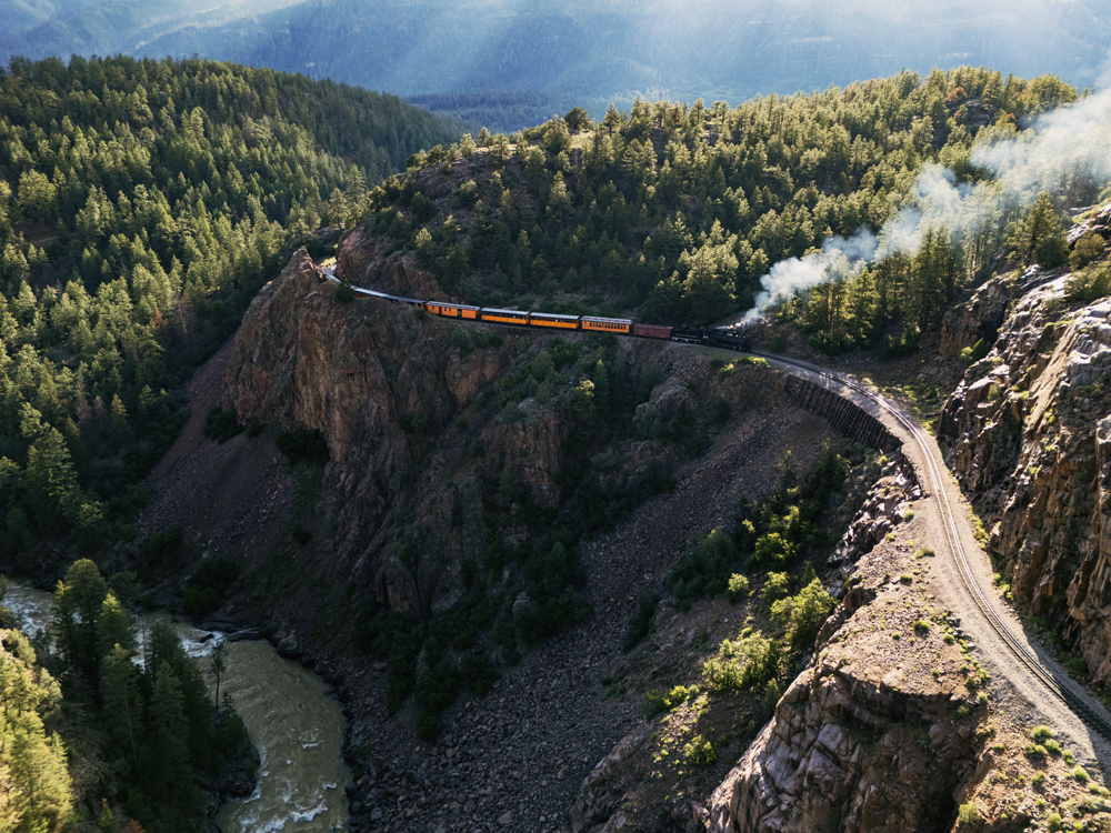 Aerial view of train on sharp curve