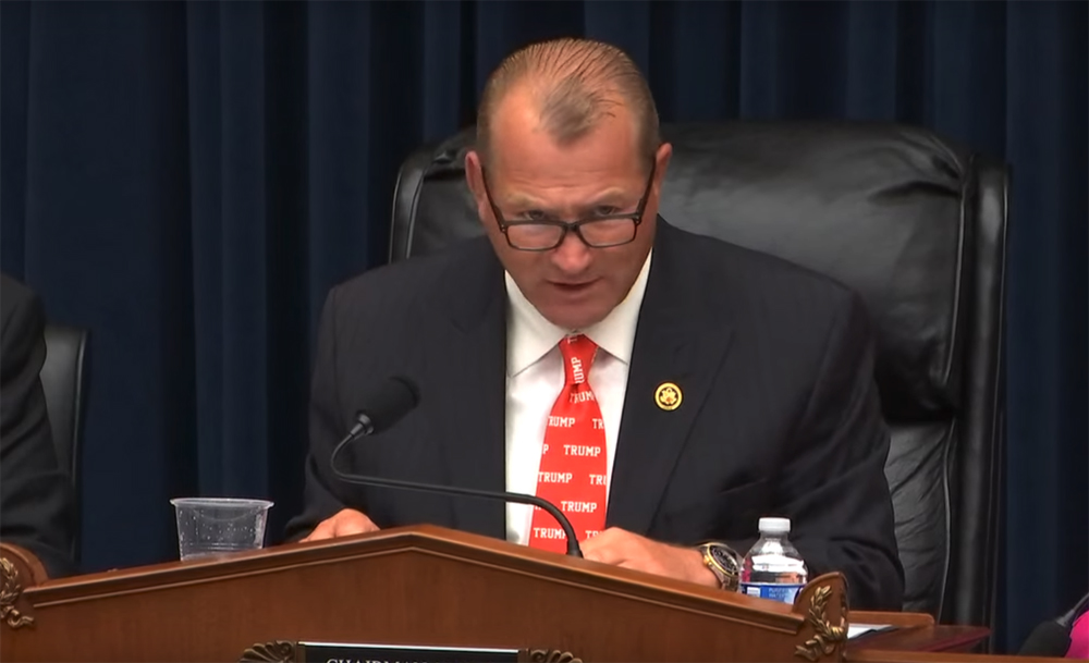 Man speaking in congressional hearing room