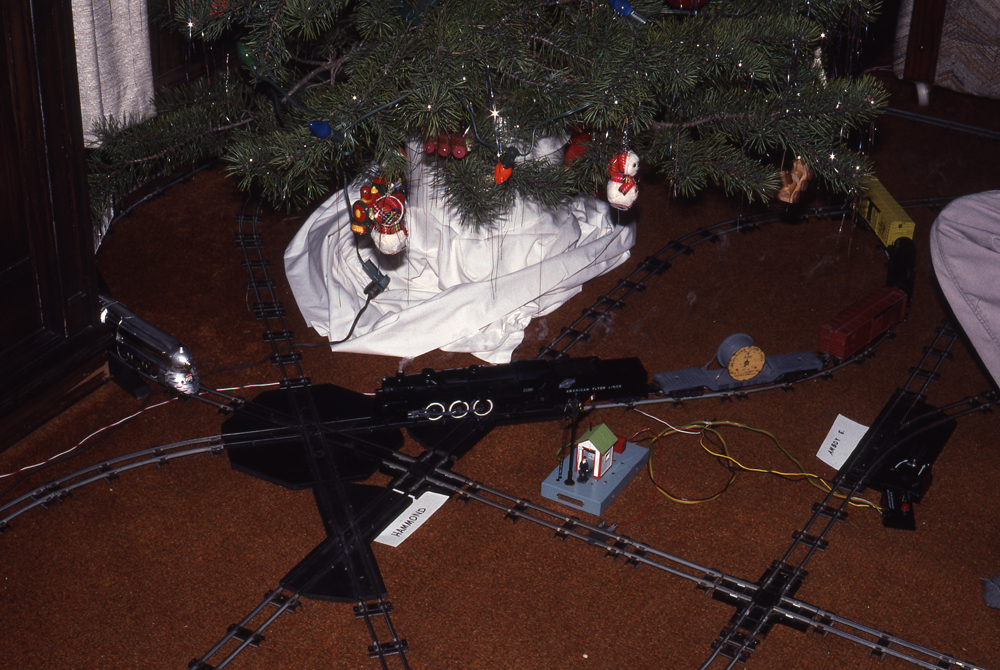 train under a Christmas tree vintage photo