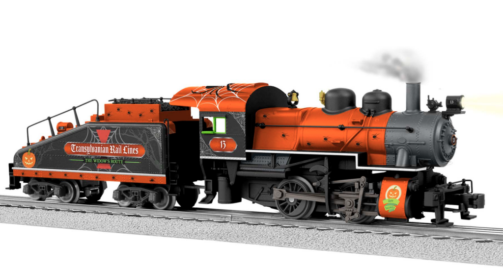 orange and black model steam locomotive