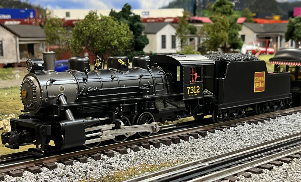 model steam locomotive on layout
