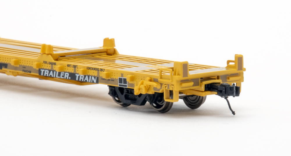 Color photo showing brake end of N scale flatcar.