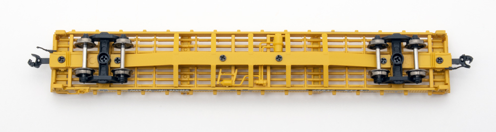 Color photo showing underbody details on N scale flatcar.