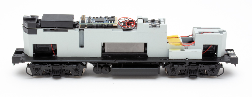 Color photo of HO scale diesel locomotive mechanism.