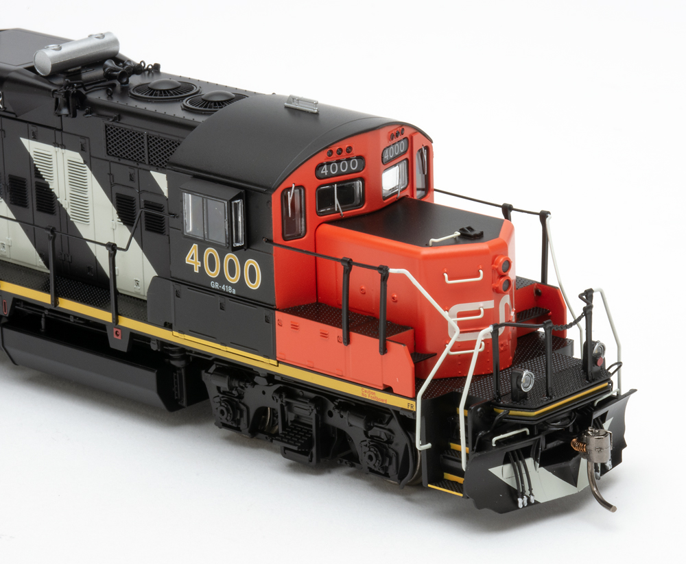 Color photo of HO scale diesel on white background.