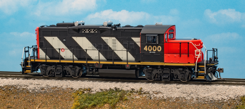 Color photo of HO scale diesel on scenicked base