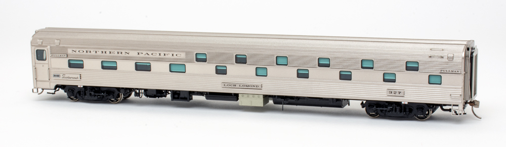 Color photo of HO scale fluted-side passenger car with staggered windows.