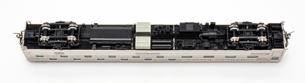 Color photo showing underbody of HO scale passenger car.