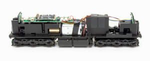 Color photo showing mechanism of HO scale diesel locomotive.