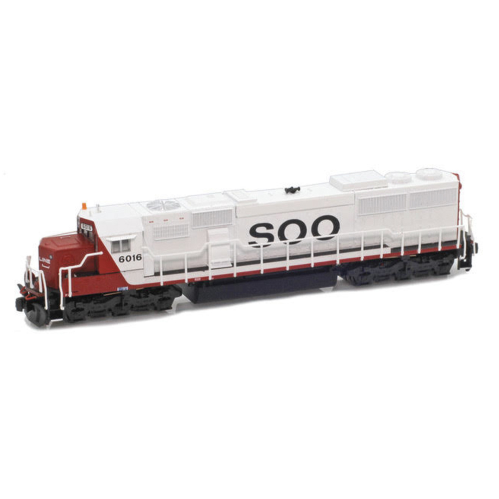 A red and white model locomotive