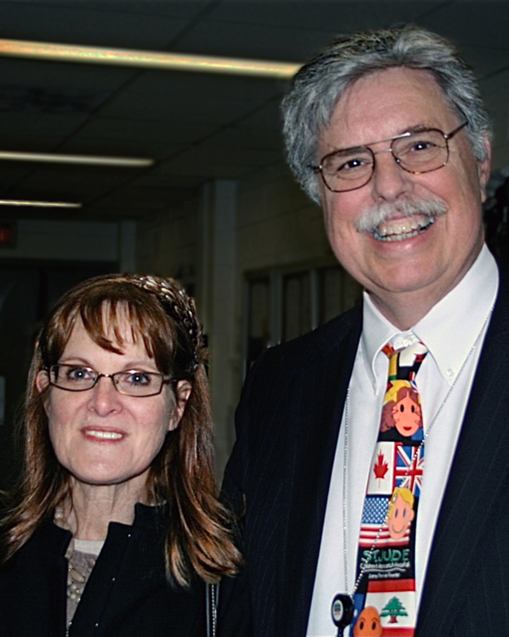 man and woman smiling at camera