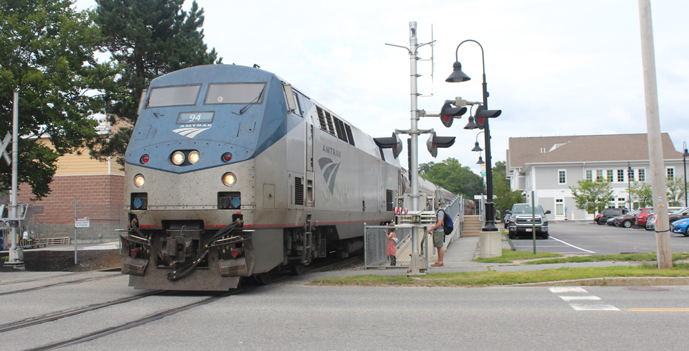 Passenger train crossing street