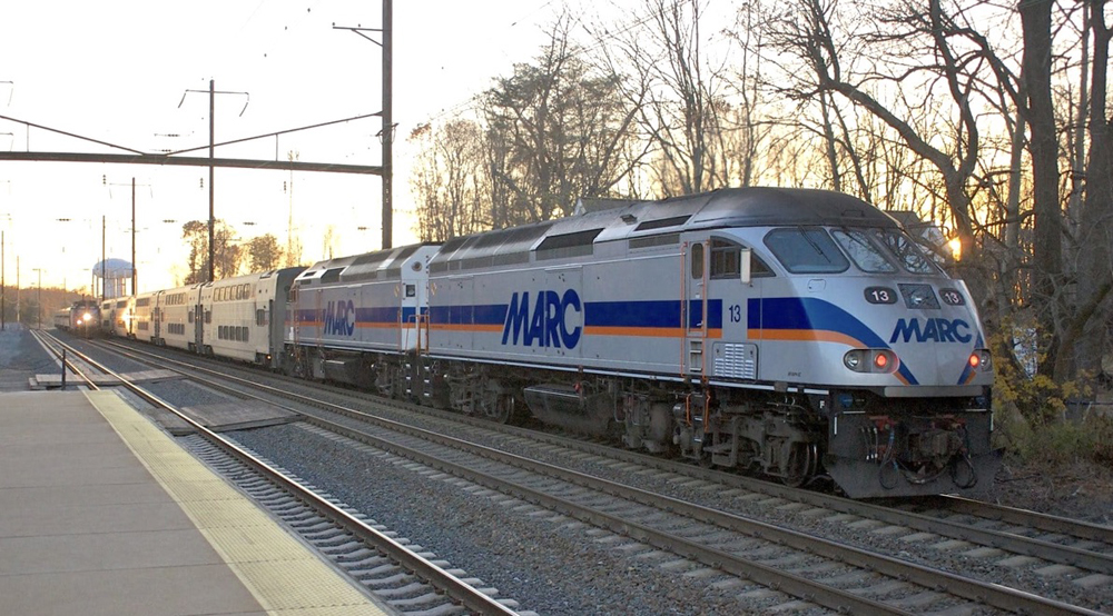 Commuter train with two engines and bilevel coaches