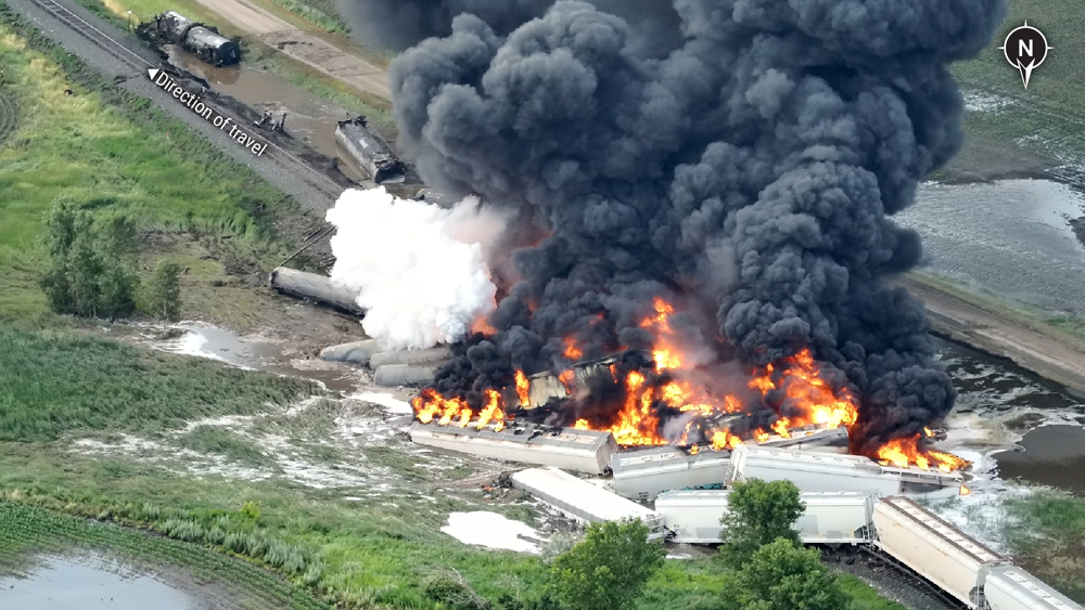 Aerial view of burning railcars at derailment