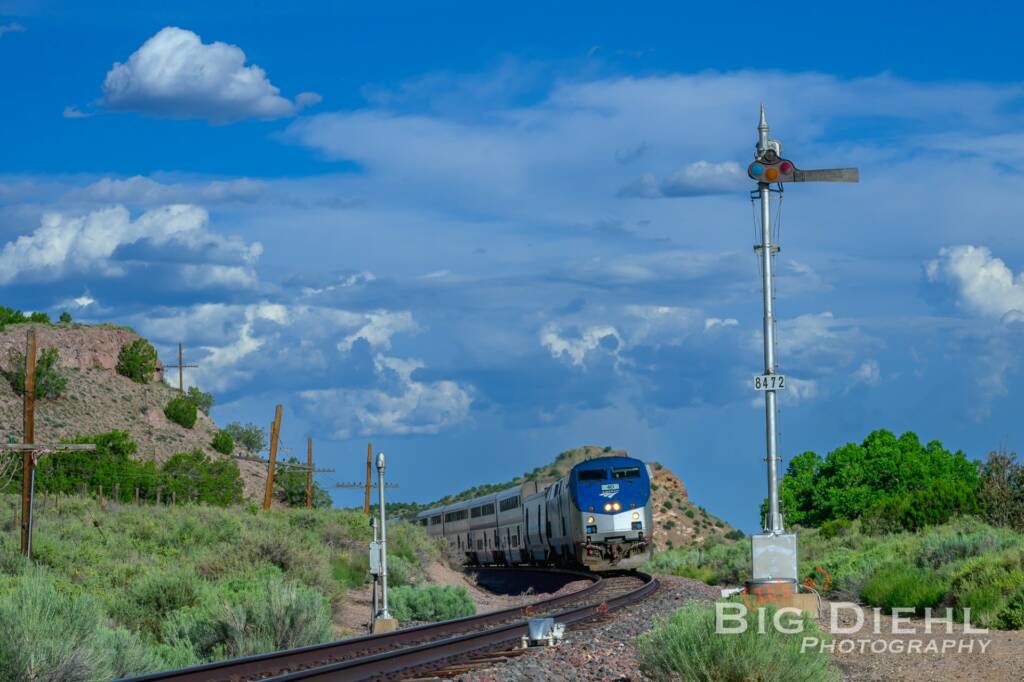 Passenger train passing semaphore signals