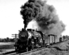 Smoking steam Atlanta & West Point locomotives with freight train