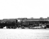 Smoking steam Atlanta & West Point locomotives with freight train