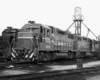 Diesel Atlanta & West Point locomotives under sanding tower