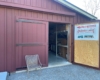 red building with open door
