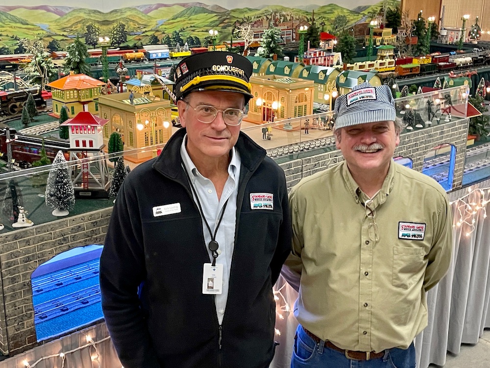  two men in front of a train layout; An interview with USA Track LLC