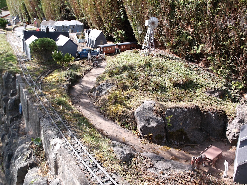  scene on garden railroad with road and windmill