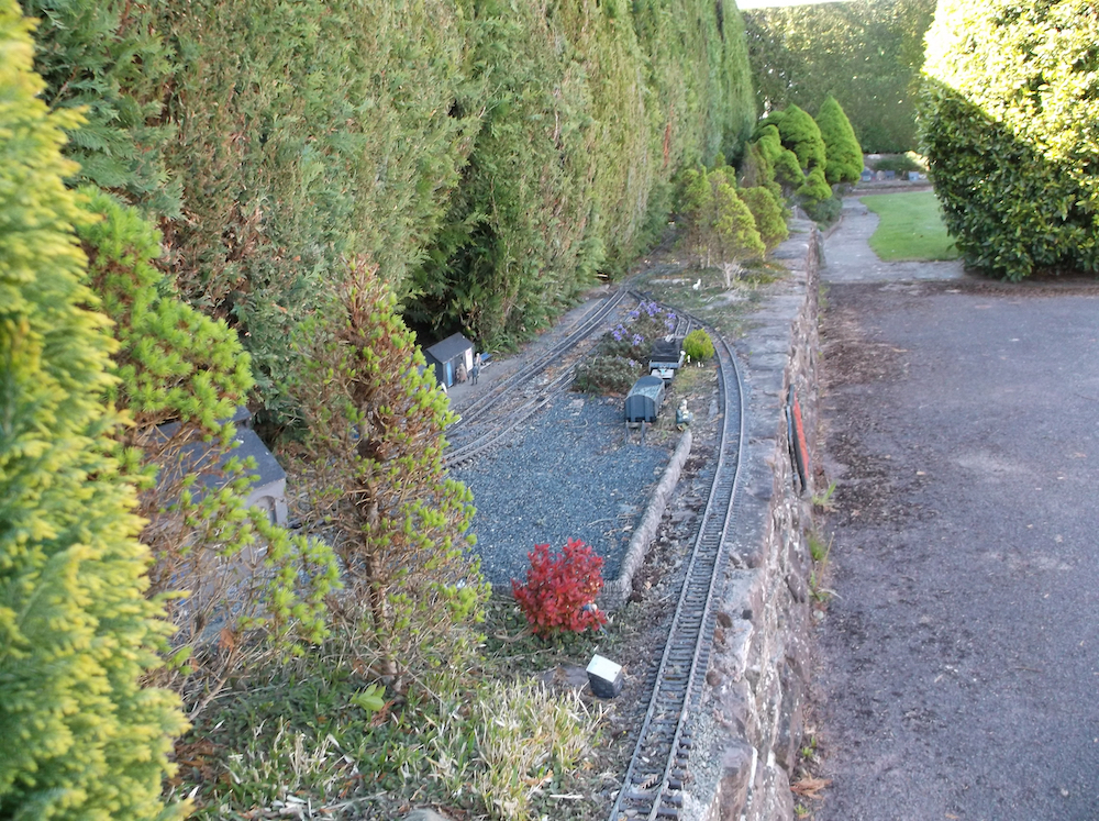 station scene on garden railway; adventure in imagination