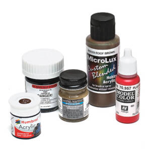 A collection of small bottles of hobby paint