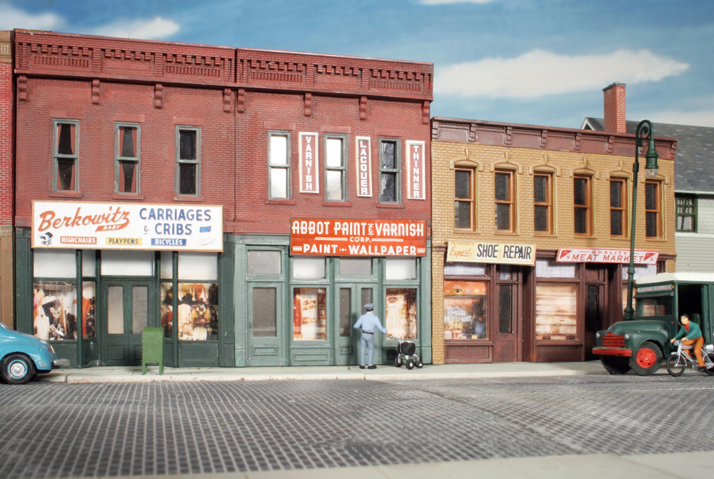 Color photo of HO scale buildings with interior details added.