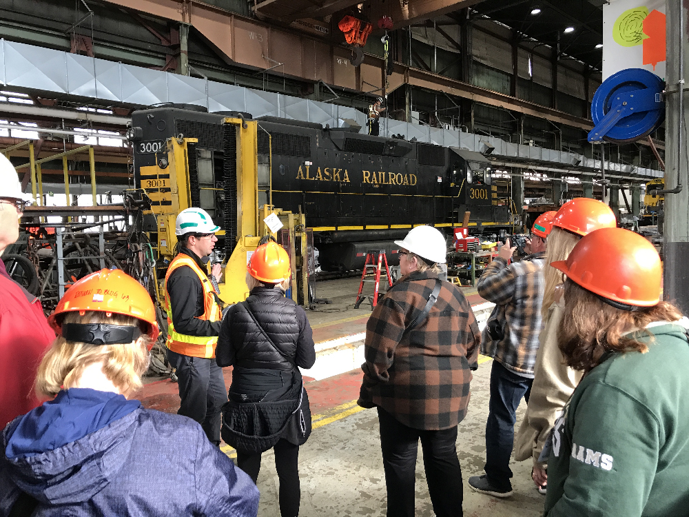 Black diesel locomotive in shop. Alaska by Rail.