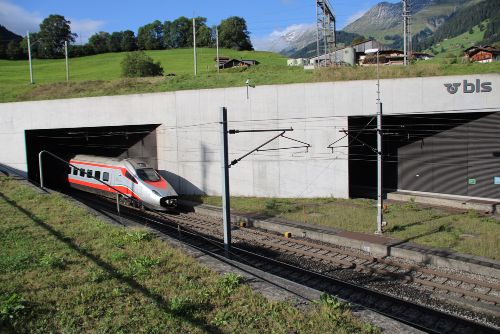 Train emerging from tunnel