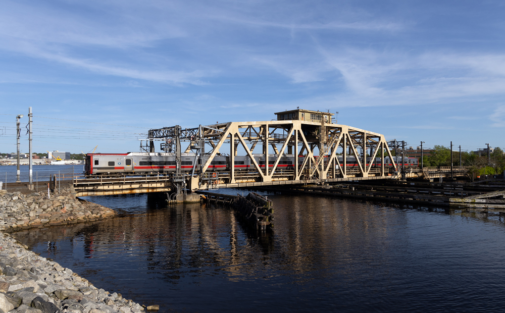 Train of electric multiple-unit cars on bridge