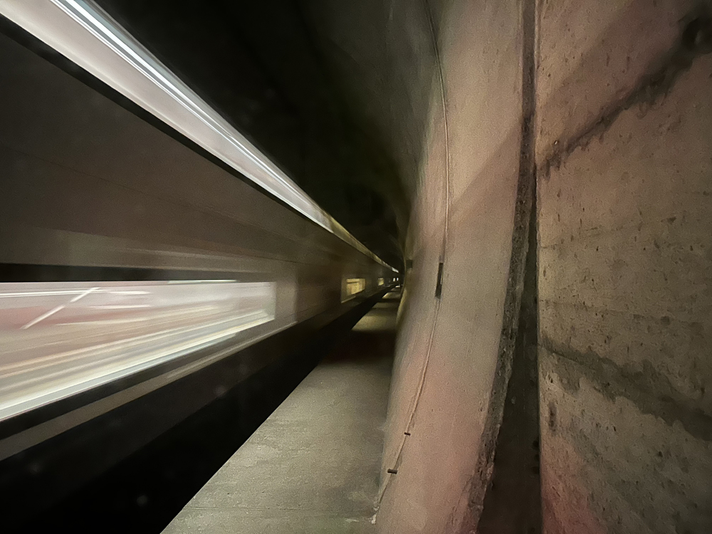 Blurred light from train inside tunnel