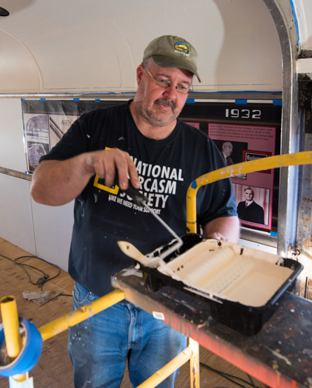 Man working inside railroad car