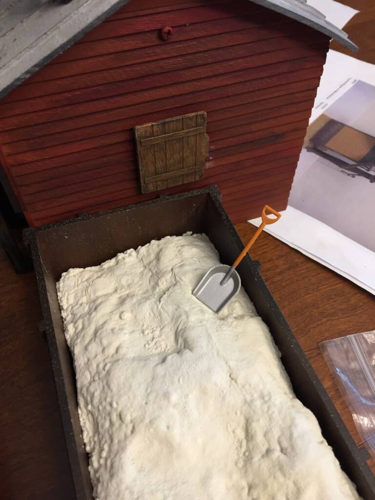 model structure with pile of sand