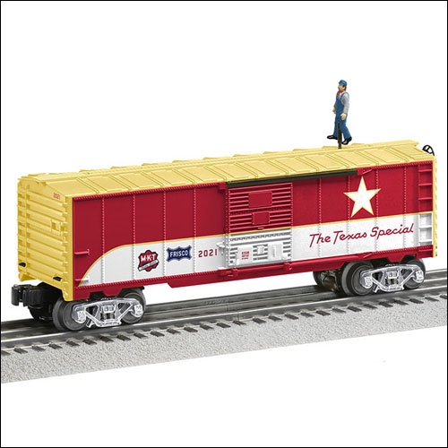 red and cream brakeman car with figure on top