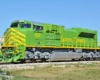 Green-and-yellow modern locomotive painted like historic Illinois Terminal locomotives