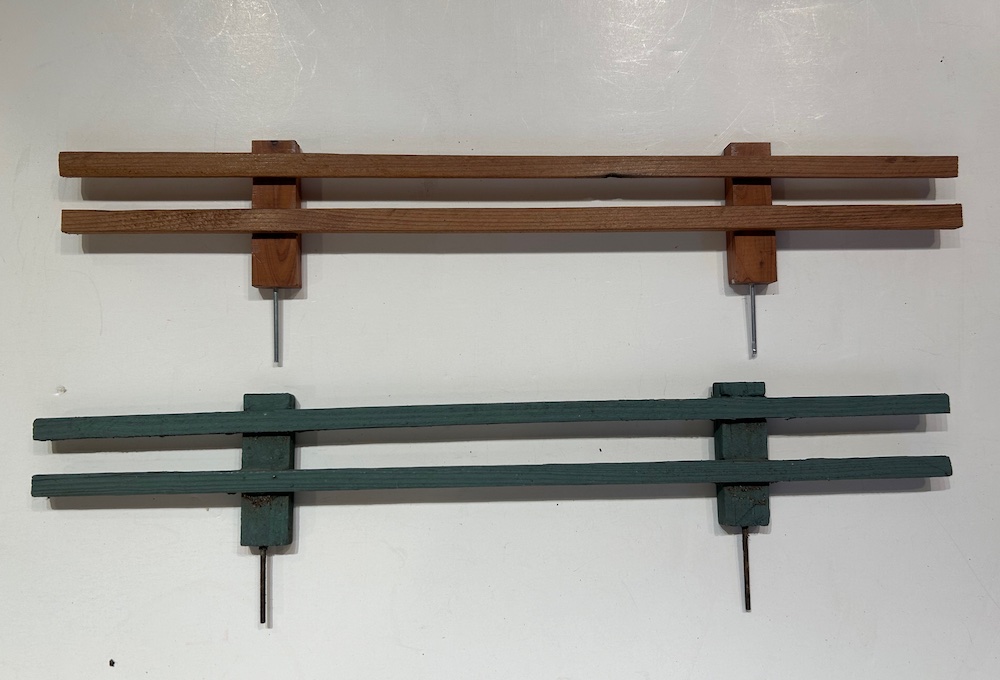 two sections of miniature fence