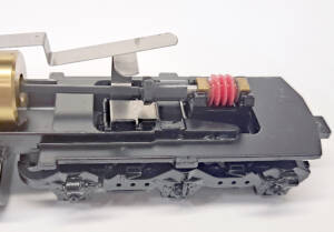 Partially disassembled Athearn diesel locomotive showing frame and truck worm gear