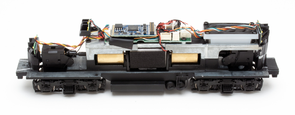 Color photo showing mechanism of HO scale diesel locomotive.