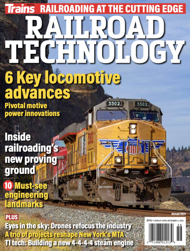 The cover for Train Magazine's Railroad Technology special issue which features large text which reads Railroad Technology and a yellow and gray locomotive