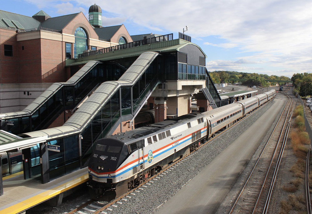 Train at large station with covered walkways